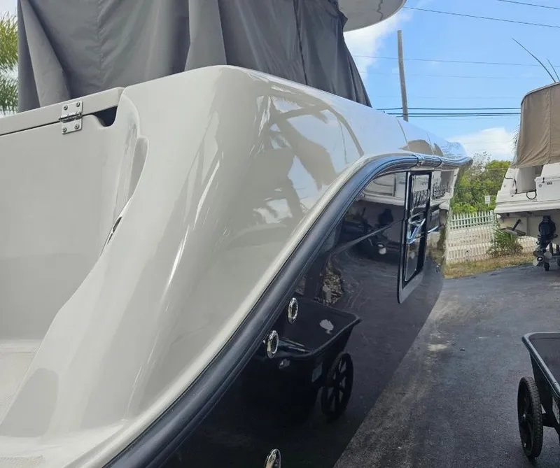 Slide: The Image of 2015 Hydra-Sports 3400 Center Console with triple Yamaha 300 V6 outboard engines. - 39