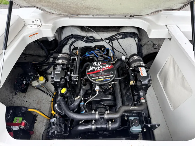 Slide: The Image of 2004 Crownline 206 LS boat engine compartment with Mercury 5.0L motor. - 7
