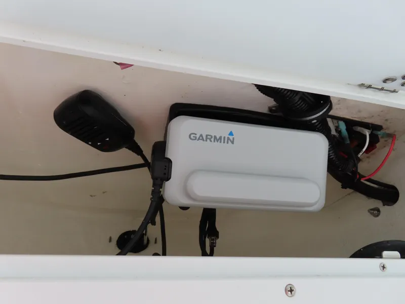Slide: The Image of Garmin device installed in a 2021 Sea Hunt Ultra 219 boat compartment. - 28