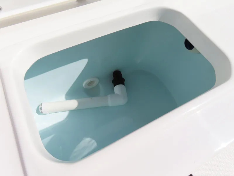 Slide: The Image of Livewell compartment in a 2021 Sea Hunt Ultra 219 boat. - 34