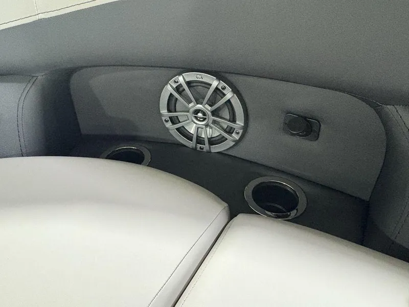 Slide: The Image of Interior of 2025 Barletta A20QC boat with speaker and cup holders. - 13