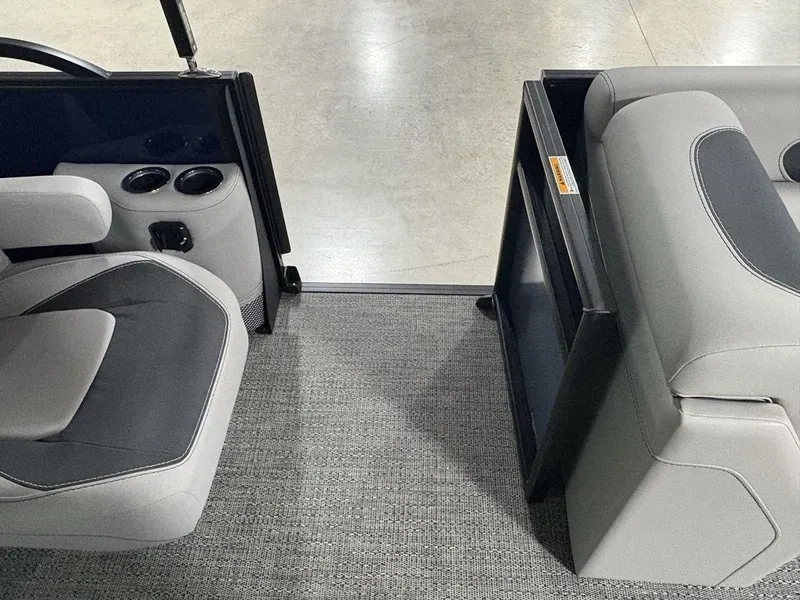 Slide: The Image of Interior of 2025 Barletta A20QC boat with gray seating and cup holders. - 18