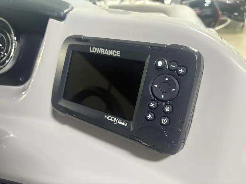 Slide: The Image of Lowrance Hook Reveal fish finder on 2025 Barletta A20QC boat dashboard. - 20