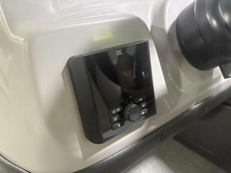 Slide: The Image of JBL audio control panel in 2025 Barletta A20QC boat dashboard. - 21