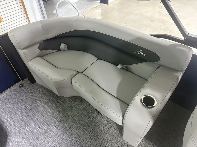 Slide: The Image of 2025 Barletta A20QC boat interior with gray seating and cup holder. - 29