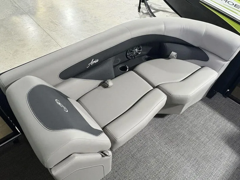 Slide: The Image of Luxurious seating in 2025 Barletta A20QC boat, featuring gray upholstery and integrated cup holders. - 8