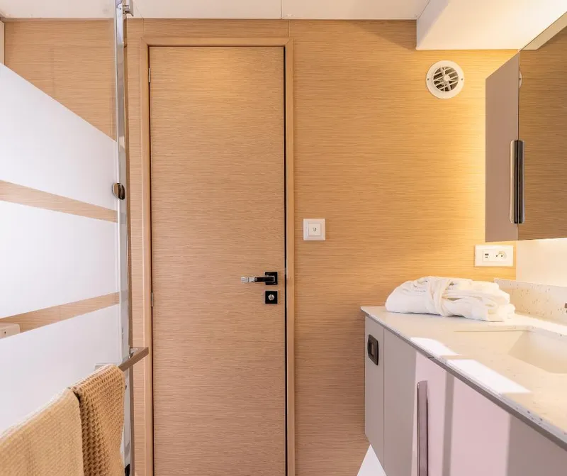 Slide: The Image of Modern bathroom interior of 2025 Fountaine Pajot NEW 41 yacht, featuring sleek design and amenities. - 20