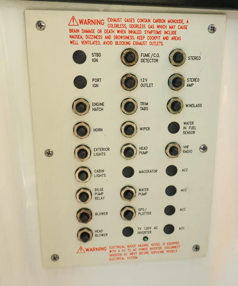 Slide: The Image of Control panel with warning labels on a 2013 Formula 290 Bowrider boat. - 14