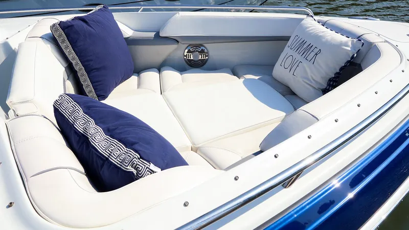 Slide: The Image of Luxurious seating area on a 2013 Formula 290 Bowrider boat with decorative pillows. - 17