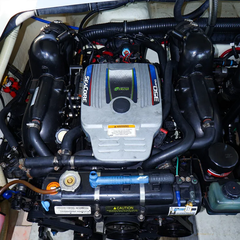 Slide: The Image of Engine of a 2013 Formula 290 Bowrider boat, featuring a Seacore 350 MAG motor. - 22