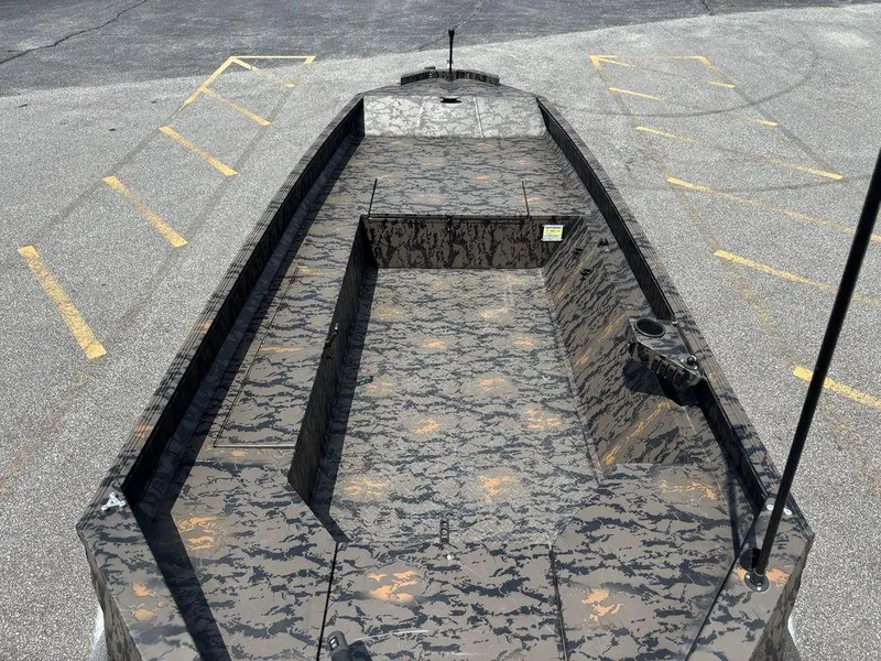 Slide: The Image of 2024 Edge Duck Boats 1756 DIAMONDBACK with camouflage design, parked on asphalt. - 10