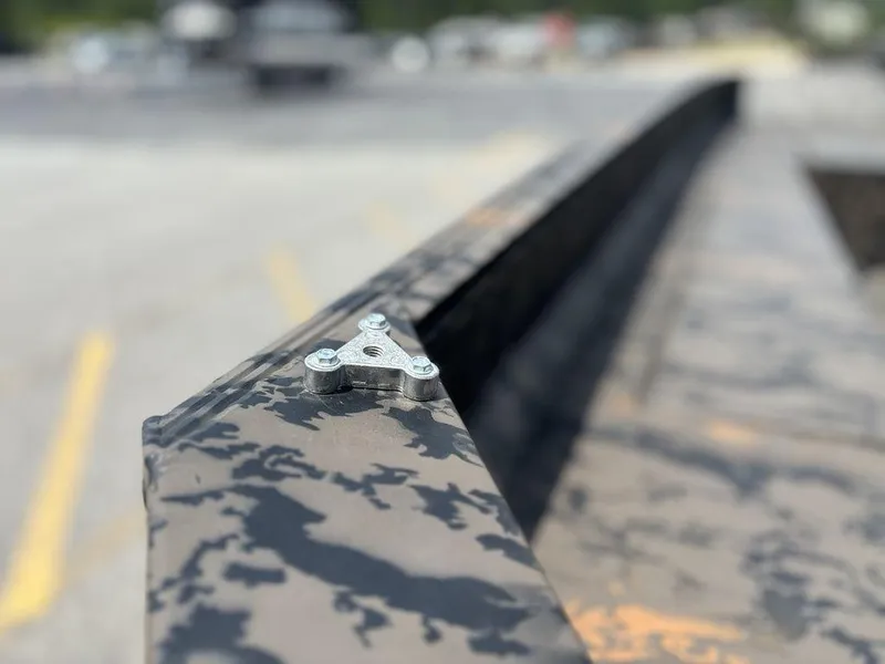 Slide: The Image of Close-up of 2024 Edge Duck Boats 1756 DIAMONDBACK with camouflage pattern and metal detail. - 12