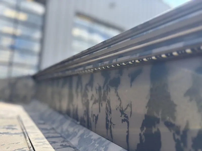 Slide: The Image of 2024 Edge Duck Boats 1756 DIAMONDBACK, close-up of camo-patterned side detail. - 17