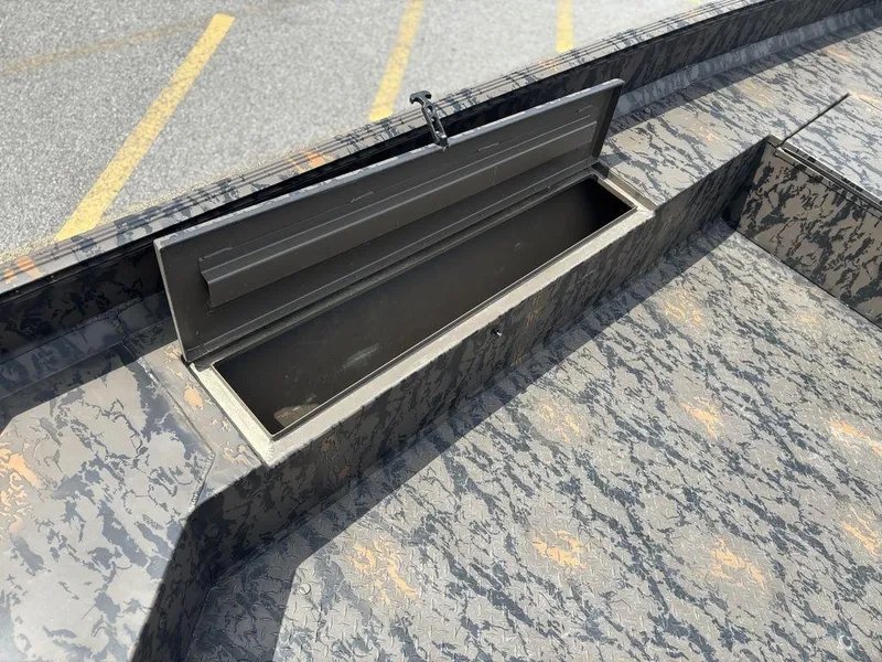 Slide: The Image of 2024 Edge Duck Boats 1756 DIAMONDBACK storage compartment with open lid, showcasing interior space. - 19