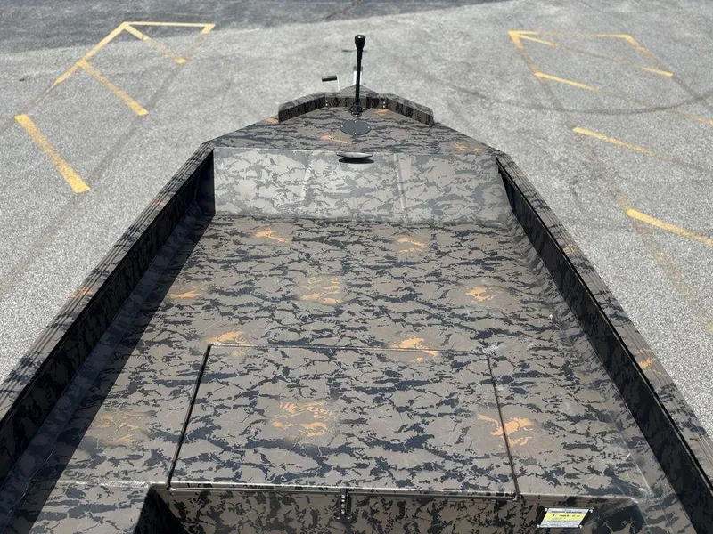 Slide: The Image of 2024 Edge Duck Boats 1756 DIAMONDBACK with camouflage pattern on a parking lot. - 20