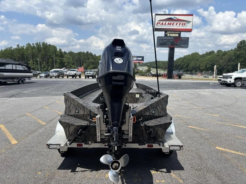 Slide: The Image of 2024 Edge Duck Boats 1756 Diamondback on trailer, outdoor dealership setting. - 5