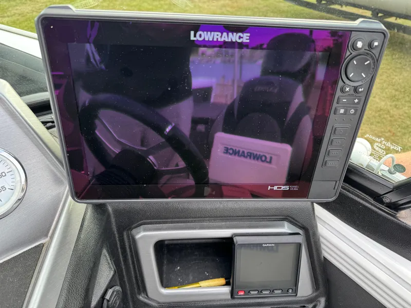 Slide: The Image of Lowrance HDS-12 display on 2021 Lund 1875 Tyee boat dashboard. - 11