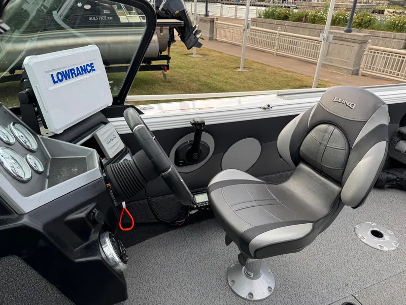 Slide: The Image of 2021 Lund 1875 Tyee boat interior with Lowrance and Garmin equipment. - 9