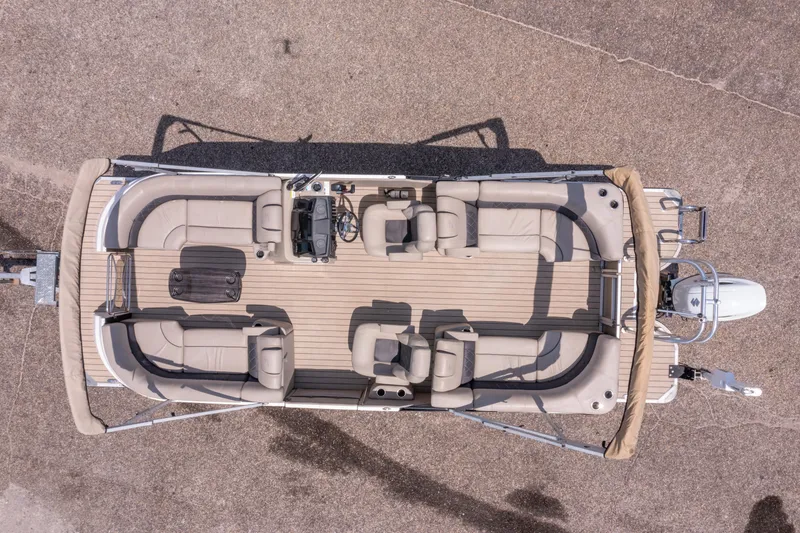 Slide: The Image of Overhead view of 2022 Silver Wave 2410 SW5 CLS pontoon boat with beige seating. - 11