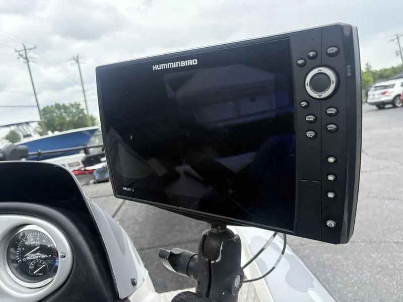 Slide: The Image of Humminbird Helix 12 fishfinder on 2008 Skeeter ZX200 boat dashboard. - 12