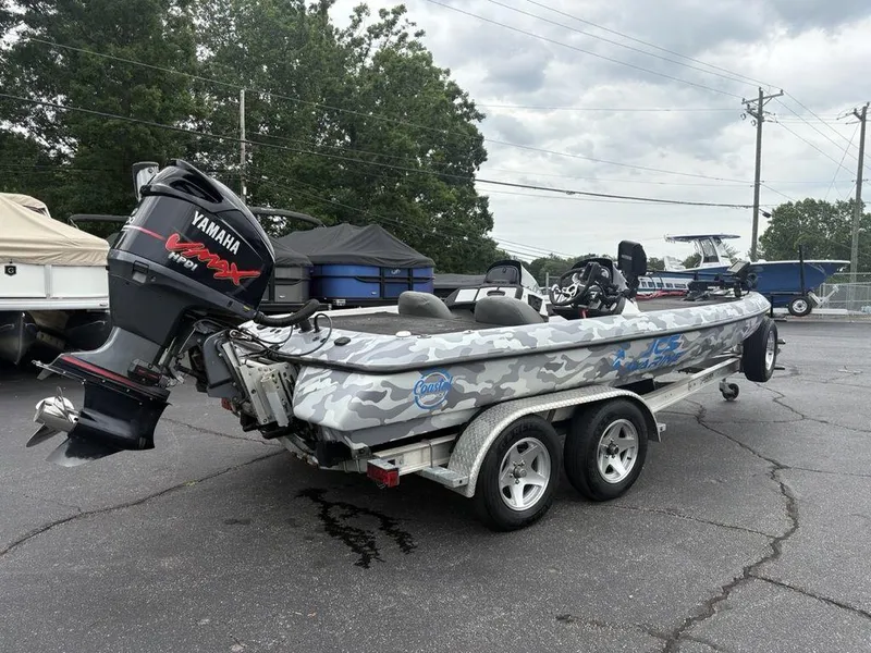 Slide: The Image of 2008 Skeeter ZX200 fishing boat with Yamaha VMAX engine, parked on a trailer. - 3