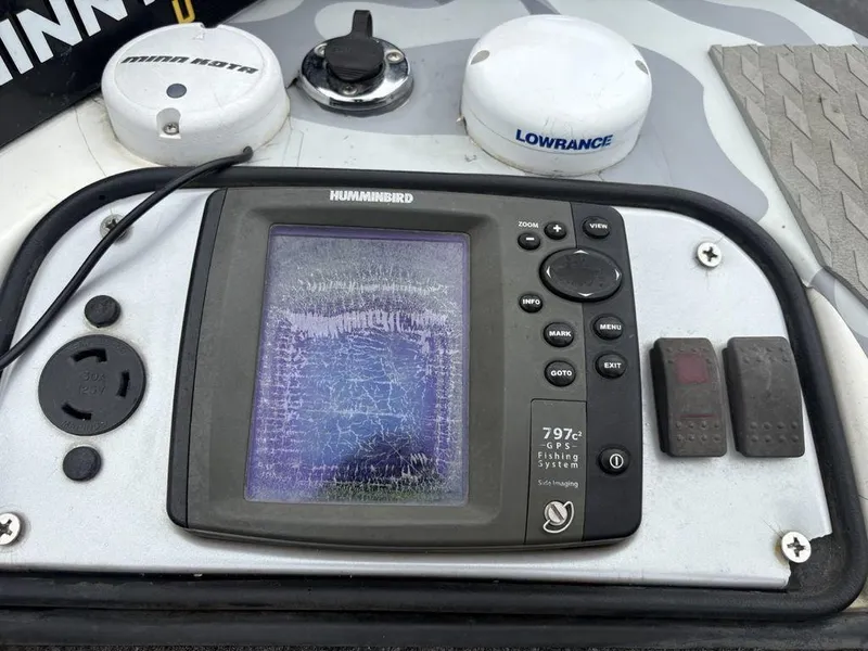 Slide: The Image of 2008 Skeeter ZX200 boat dashboard with Humminbird GPS fishing system. - 4