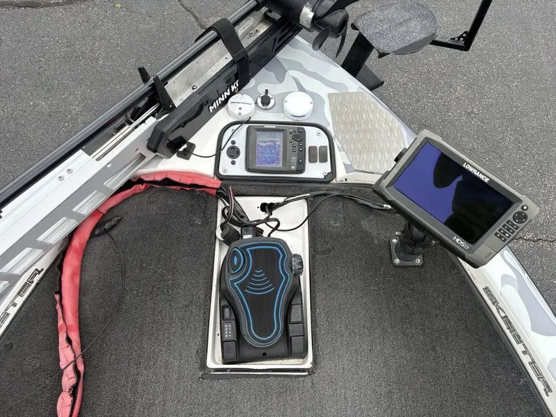 Slide: The Image of 2008 Skeeter ZX200 boat dashboard with electronics and navigation equipment. - 5