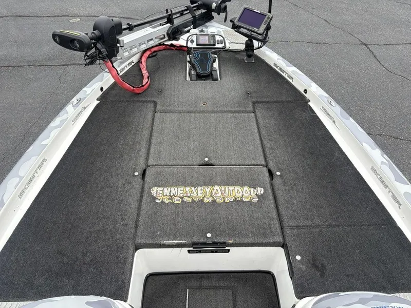 Slide: The Image of 2008 Skeeter ZX200 boat deck with electronics and trolling motor. - 6