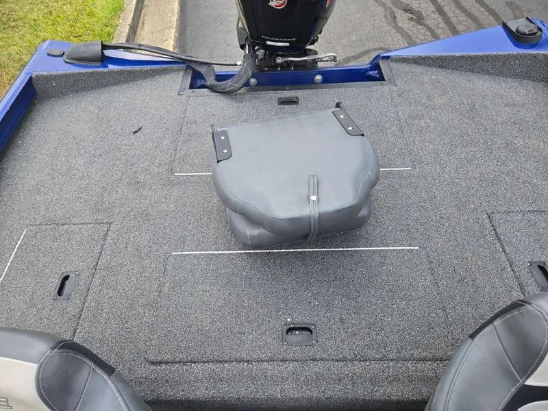 Slide: The Image of 2021 Lowe Stinger 188 boat deck with motor and seating. - 20