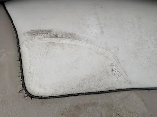 Slide: The Image of Dirty upholstery on a 2004 Sea Ray 240 Sundeck boat. - 17