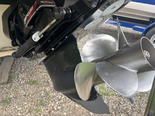 Slide: The Image of 2004 Sea Ray 240 Sundeck boat propeller and engine detail. - 3