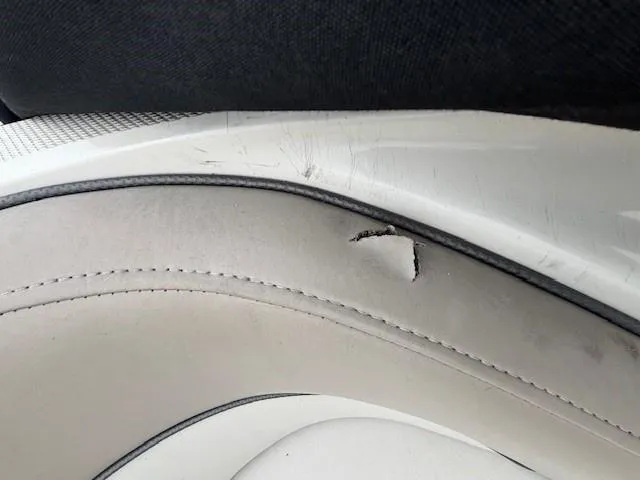 Slide: The Image of Torn upholstery on 2004 Sea Ray 240 Sundeck boat seat. - 30