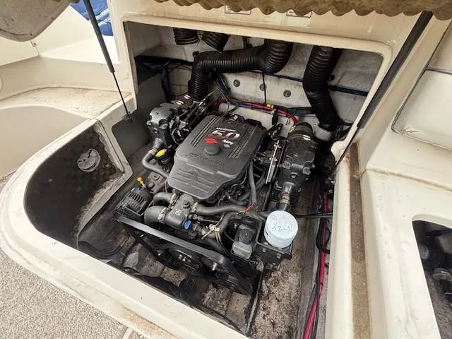 Slide: The Image of Engine compartment of a 2004 Sea Ray 240 Sundeck boat. - 32