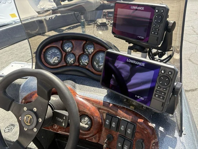 Slide: The Image of Dashboard of 2000 Triton TR205 DC Walleye boat with Lowrance HDS displays. - 22