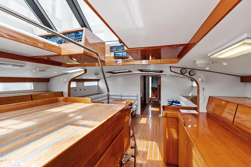 Slide: The Image of Luxurious 1998 Custom Kelly Archer yacht interior with polished wood and modern design elements. - 18
