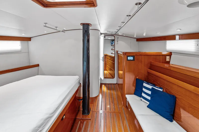 Slide: The Image of Luxurious 1998 Custom Kelly Archer yacht interior with wooden finishes and cozy seating area. - 23