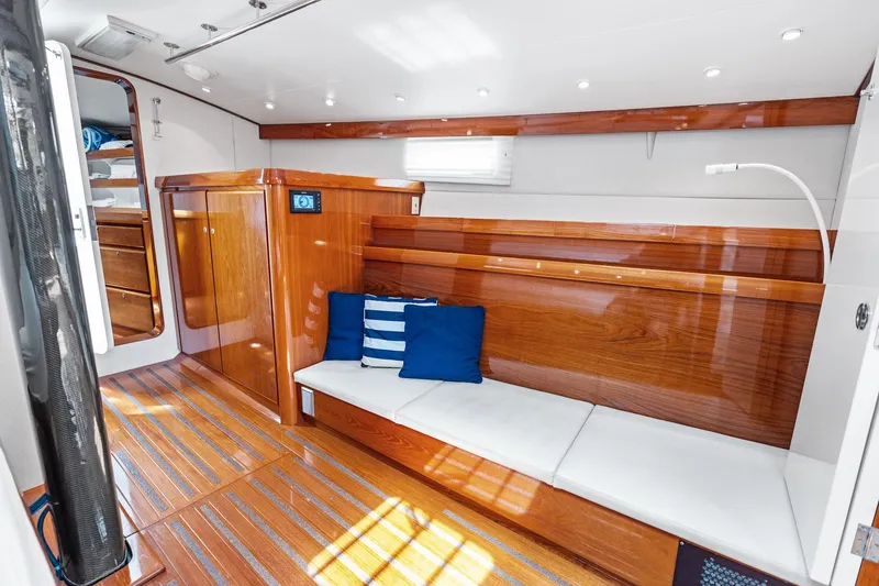 Slide: The Image of Luxurious wooden interior of 1998 Custom Kelly Archer yacht with seating and cushions. - 24