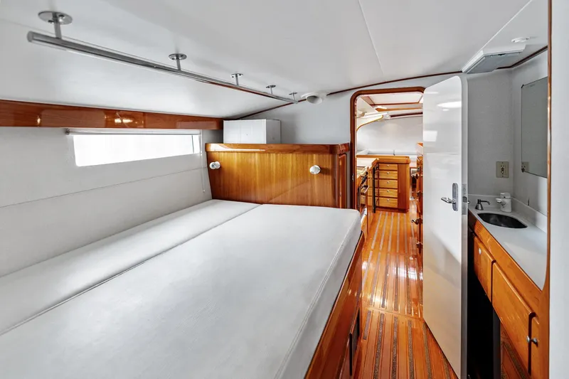 Slide: The Image of Luxurious cabin interior of 1998 Custom Kelly Archer yacht with wooden finishes and modern amenities. - 26