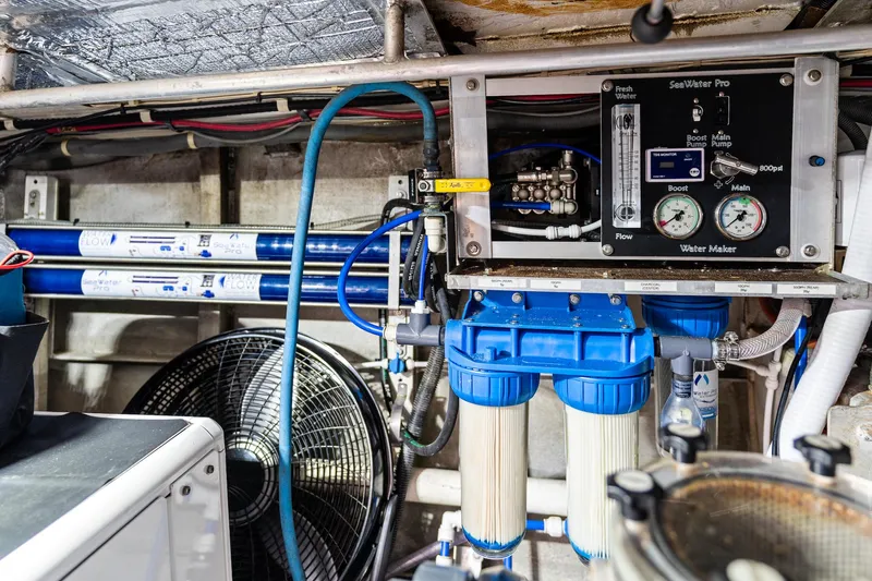 Slide: The Image of Water filtration system in a 1998 Custom Kelly Archer boat engine room. - 44