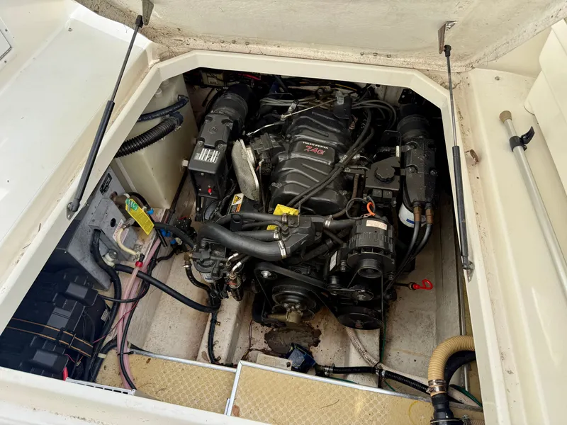 Slide: The Image of Engine compartment of a 2001 Larson Cabrio 270 boat. - 26