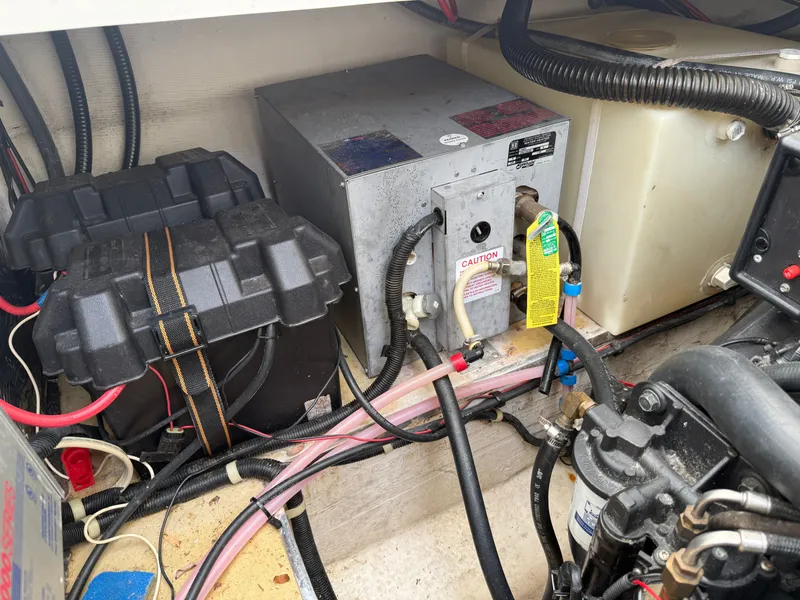 Slide: The Image of Engine compartment of a 2001 Larson Cabrio 270 boat with wiring. - 28