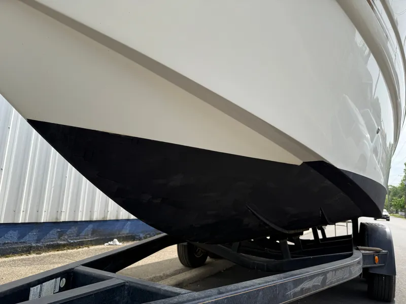 Slide: The Image of Larson Cabrio 270 boat hull on trailer, year 2001. - 5