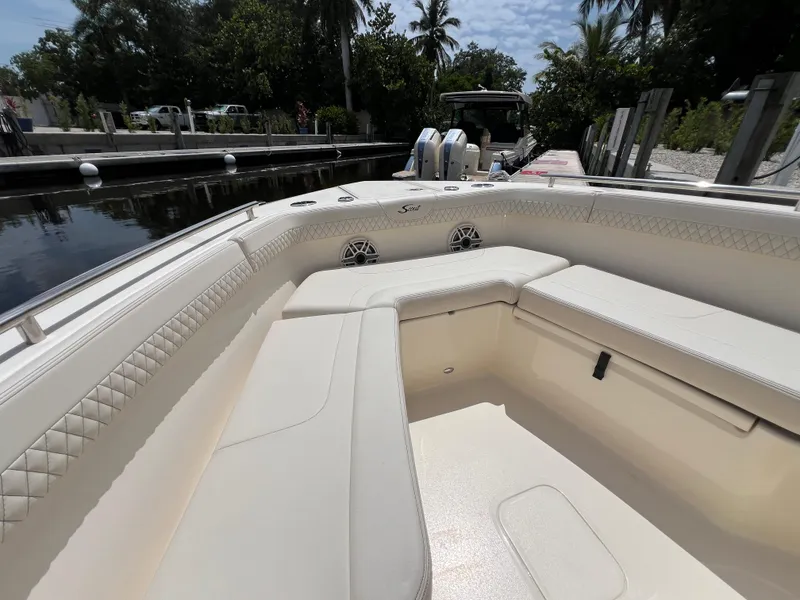 Slide: The Image of 2026 Scout 260 LXF boat interior with luxurious seating and elegant design. - 31
