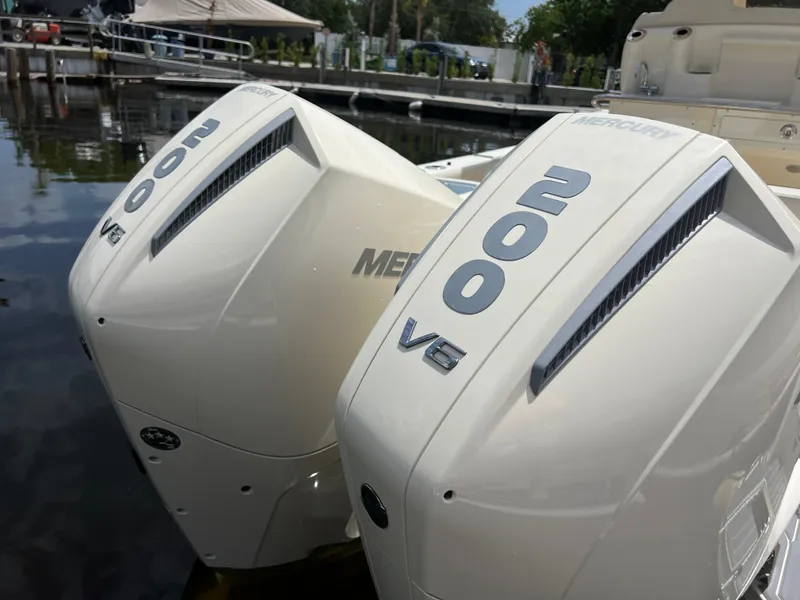 Slide: The Image of Twin Mercury 200 V6 outboard engines on a 2026 Scout 260 LXF boat. - 8