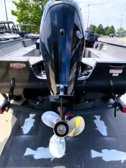 Slide: The Image of 2022 Tracker Pro Guide V-16 SC boat with outboard motor, rear view. - 4