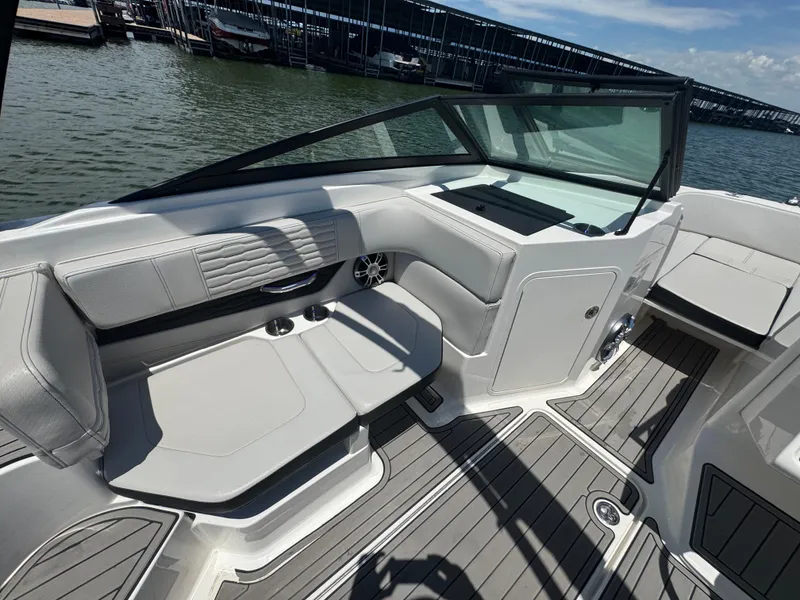 Slide: The Image of 2023 Sea Ray SPX 190 boat interior with sleek seating and modern design. - 13