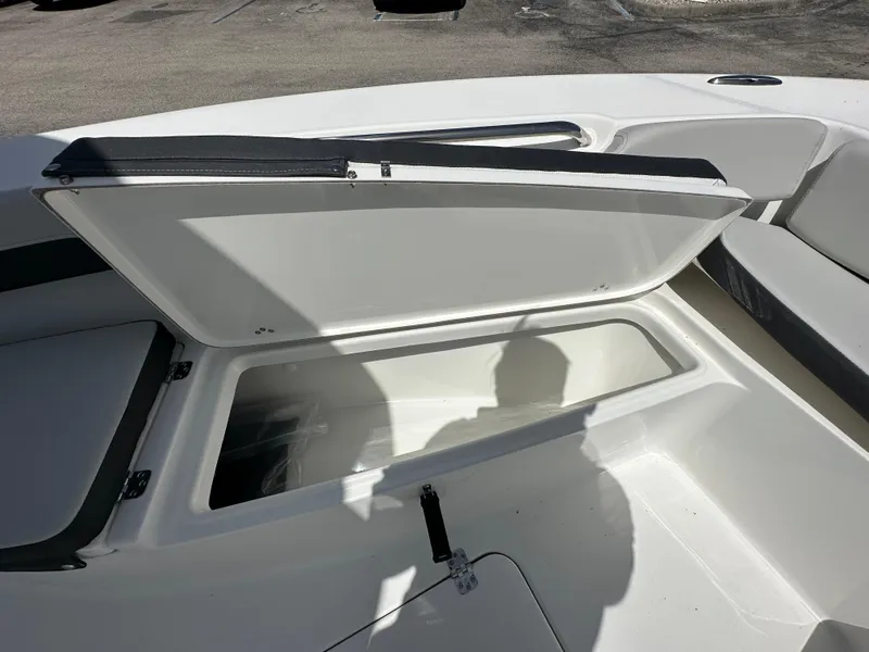 Slide: The Image of Open storage compartment on 2026 Sea Pro 202 Center Console boat. - 7