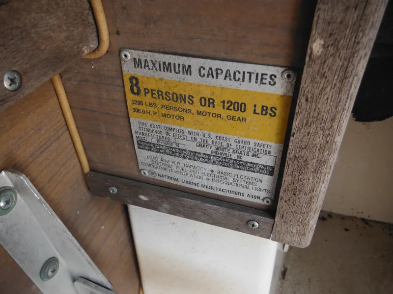 Slide: The Image of 1988 Grady-White Offshore 240 capacity plate, 8 persons or 1200 lbs, 300 H.P. motor. - 11