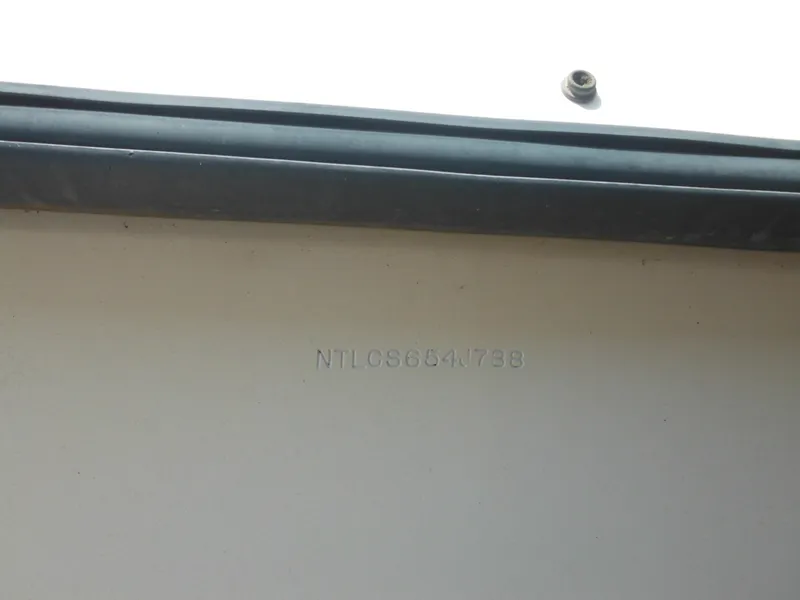 Slide: The Image of 1988 Grady-White Offshore 240 boat hull identification number (HIN) close-up. - 3