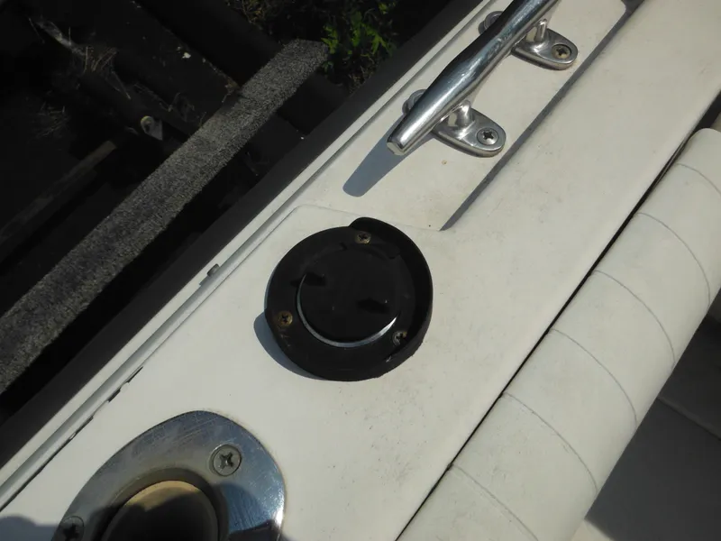 Slide: The Image of 1988 Grady-White Offshore 240 boat deck with cleat and fuel cap. - 37